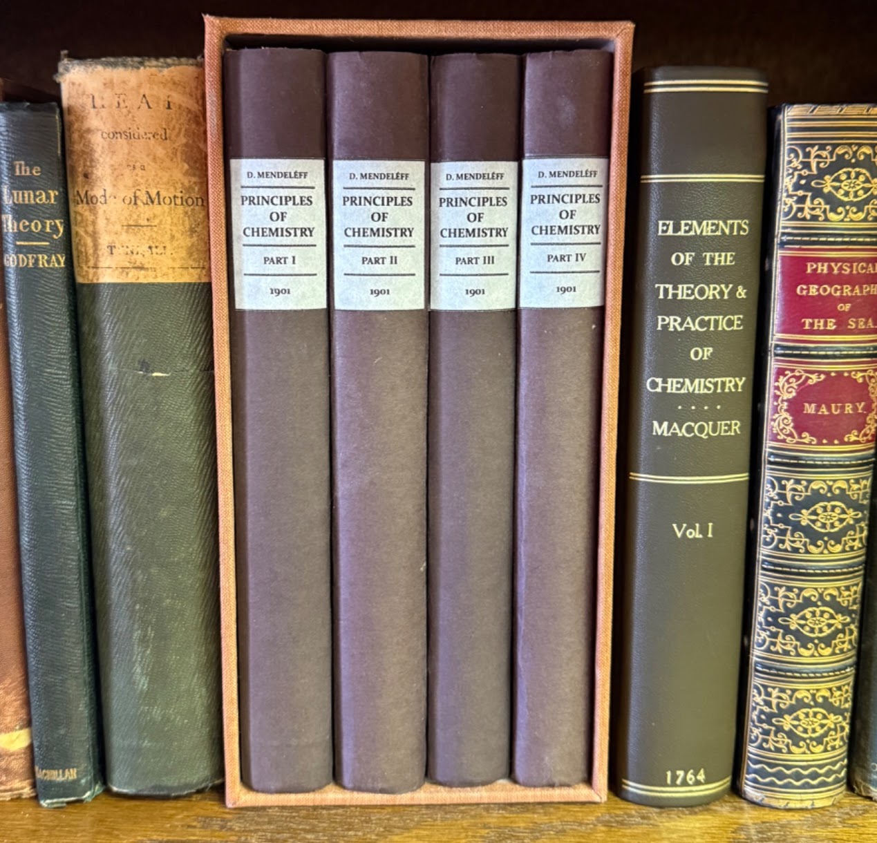 The four volumes together on the shelf
